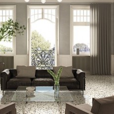 Salon met glazen tafel op witte terrazzo tegels keramisch