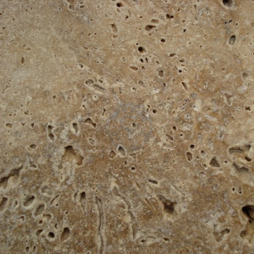 Voorbeeld ruwe beige kalksteen