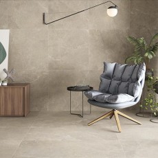 Moderne stoel op vloer betonlook tegels en muur