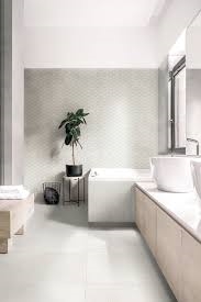 Moderne lichte badkamer met grijze betonlook tegels